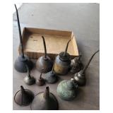 Oil cans, funnels