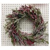 Beautiful flocked wreath with holly berry