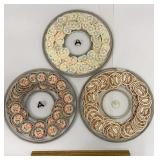 3 round plastic containers of advertising