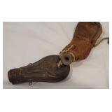 2 ammo flasks - the leather one has lead shot