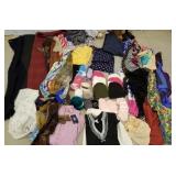 Lots of beautiful scarves and tablecloth, shirts