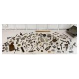 2 small metal tins full of misc guy junque