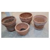 4 clay pots