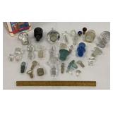 Cracker Jack tin of glass stoppers