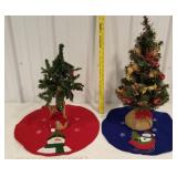 2 small Christmas trees and skirts