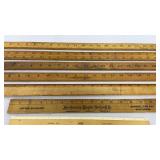 Bundle of old rulers/yardsticks
