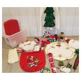 Christmas items, tree skirt, snowman, in a clear