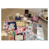 Clear tub of Christmas, black boards, some junque