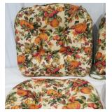 6 Chair cushions with pumpkins on them,