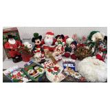 2 clear tubs of Christmas stuffed animals & decor