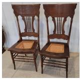 2x$ - 2 oak spindle back chairs
