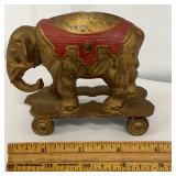 Bobble-head cast iron elephant