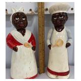 Pair of tall black Americana s&p shakers- his