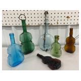 Box of colorful violin/banjo bottles