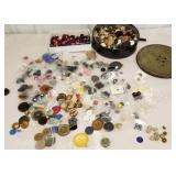 Lot of mixed buttons in tin