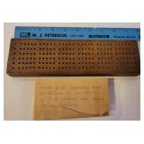 1908 cribbage board made from an apple tree root