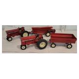 2 international tractors with wagons