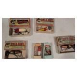 6 Heddon fishing lures in box
