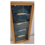 4 lures in shadow box