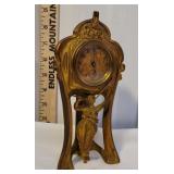 Figural clock