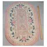 Oval pink roses hook rug