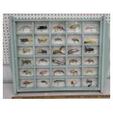 Shadow box full of fishing lures - they have been