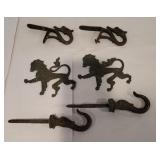 Serpent hooks, lion applique