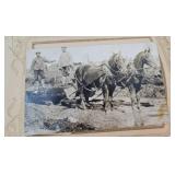 Celluloid covered photo album - a few postcards