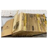 John Deere parts catalogs (67-70) on metal