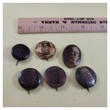 6 political buttons - all have been damp