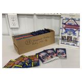Unopened football & baseball cards from the