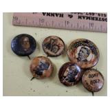 6 political buttons - all have been damp