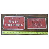 2 cast iron signs