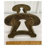 Adjustable art nouveau book holder