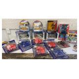 Box of sports related toys/bears/cards etc