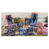 Box of sports related action figures etc..