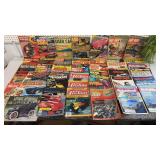 Big pile of automotive magazines from the