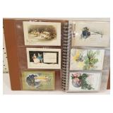 Postcards in a brown folder