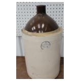 5 gallon brown and white jug
