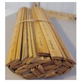 Bundle of old school house rulers