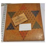 Beautiful Chinese checkers board with marbles and