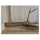 2 wooden toy canoes