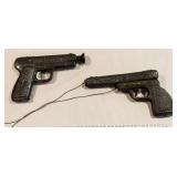 1950s tin pop gun and dart gun