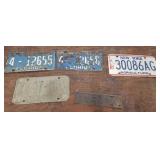 Florida and NY license plates, Ithaca sign