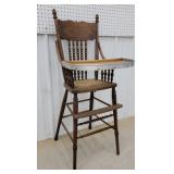 Crest back highchair