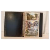 Postcards in black binder