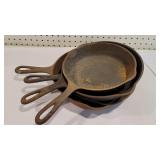 4 Griswold and Wagner cast iron pans