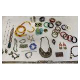 Artsy collection of beaded & glass jewelry,