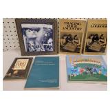 Box of ancestry books and Ithaca beautiful women