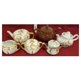 4 tea pots, 1 from Germany with creamer and
